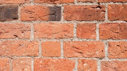 Rote Ziegelsteinwand mit Textur