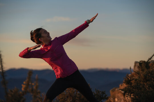 Cheerful woman gesturing outdoors