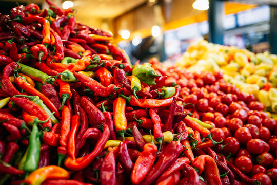 Red chili pepper with vegetables in market