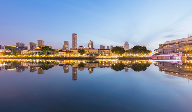 Singapore, Long exposure of Civic District buildings reflecting in Singapore River at dawn