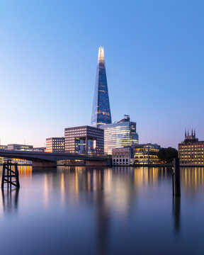 UK, England, London, Long exposure of River Thames at dawn with London Bridge and The Shard in background