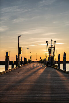 Denmark, Romo, Empty pier at sunset