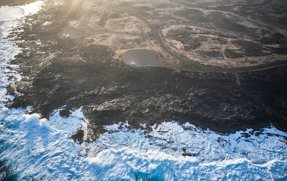 Spain, Canary Islands, Aerial view of rocky coastline of&nbsp;Boca&nbsp;de&nbsp;Abajo&nbsp;beach at dawn