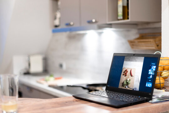 Laptop in kitchen at home