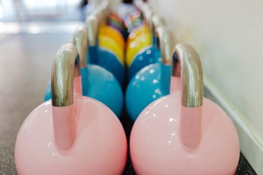 Multi colored exercise equipment in gym