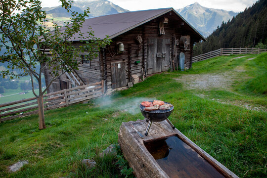 Barbecue grill outside wooden hut at Mayrhofen, Zillertal, Austria