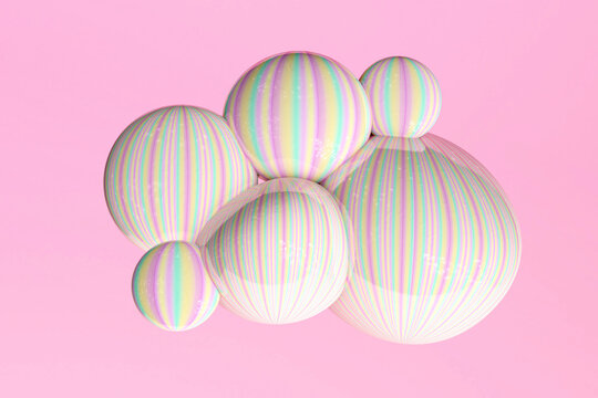 Yellow, green and pink pastel bubbles against pink background