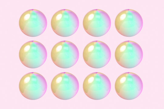 Three dimensional pattern of rows of bubbles against pink background