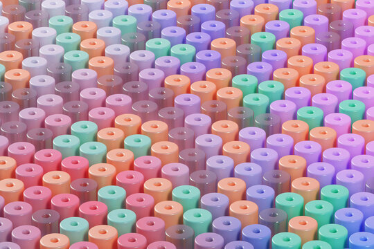 Three dimensional pattern of rows of pastel colored cylinders