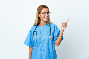 Surgeon doctor woman over isolated white background intending to realizes the solution while...