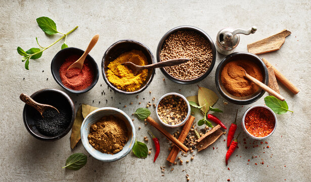 Studio shot of bowls with various Asian spices