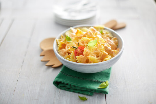 Bowl Of Pasta Salad Lying On Top Of Folded Napkin