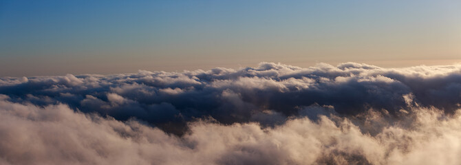 High view of the mountains and view down to the sea, mountains and sunset