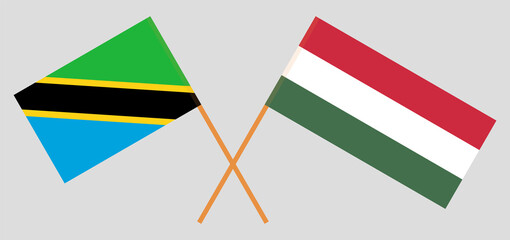 Crossed flags of Tanzania and Hungary. Official colors. Correct proportion