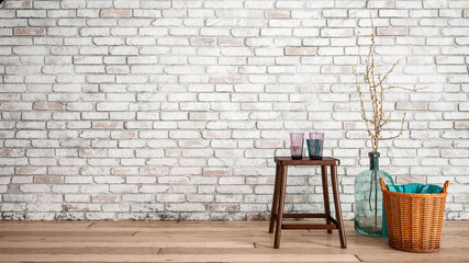 Three dimensional render of stool, basket and bottle with twigs standing in front of brick wall