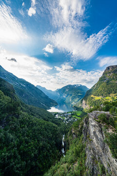 Norway, More og Romsdal, Scenic view of clouds over secluded village in Geiranger Fjord