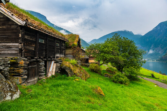 Norway, Aurland, Cottage of traditional village Otternes over Aurlandsfjord