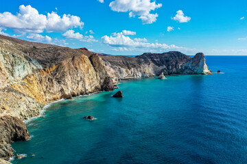 Greece, Santorini, Cliffs along blue sea