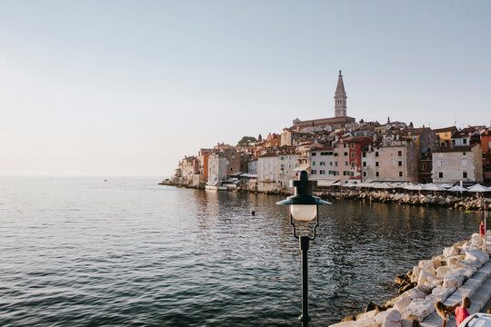 Croatia, Istria, Rovinj, Old town buildings stretching along coast of Istrian peninsula