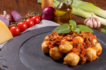 Bolognese gnocchi with natural organic tomato sauce, without pesticides