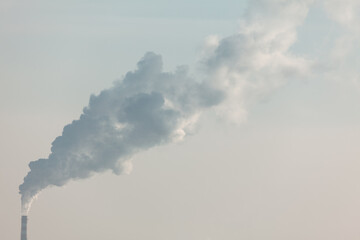 Gray toxic industrial smoke . Climate change concept . Air pollution from power plant pipe
