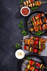 Grilled kebabs with meat, mushrooms and vegetables