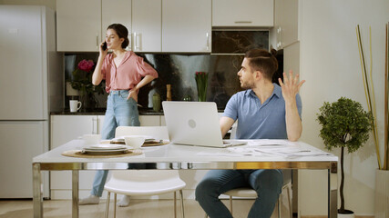 A wife doesn't let her husband to concentrate on his work because of her talking 