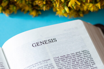 Genesis Book from Holy Bible inspired by God and Jesus Christ written by Moses. A book of the creation and beginning from Adam and Eve.  - obrazy, fototapety, plakaty