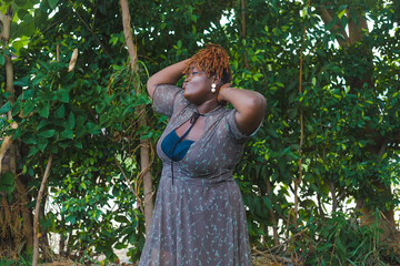 Woman being playful in her garden 