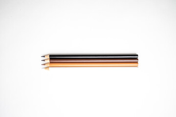 Brown Pencils on White Background