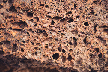 Close up detail of volcanic lava rock basalt found in the desert