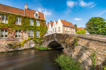 Fototapeta na wymiar Traditional medieval architecture near Bruges canal. Belgium