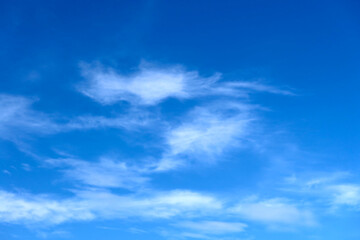 Naklejka na ściany i meble Blue sky with beautiful natural white clouds background