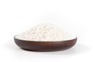 Raw organic white rice on white background, glutinous rice or sticky rice close up