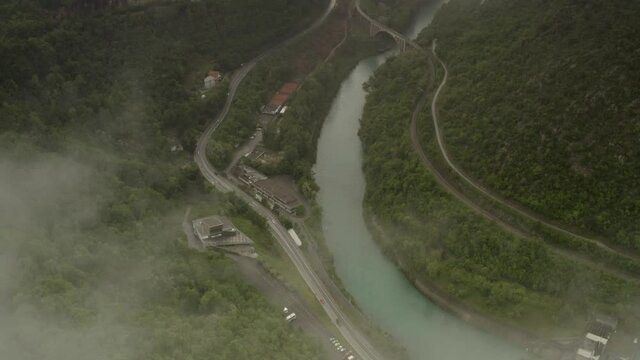 Aerial view over Solkan Bridges, Slovenia 
Solkan Bridges Acros Soca Under Mount Sabotin Soon After Rain. Look at the Both Sides of Italo Slovene Border,2021
