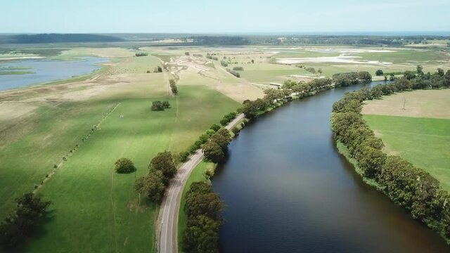 Drone flying along the Snowy River and adjacent wetlands near Marlo, in Gippsland, Victoria, Australia, December 2020