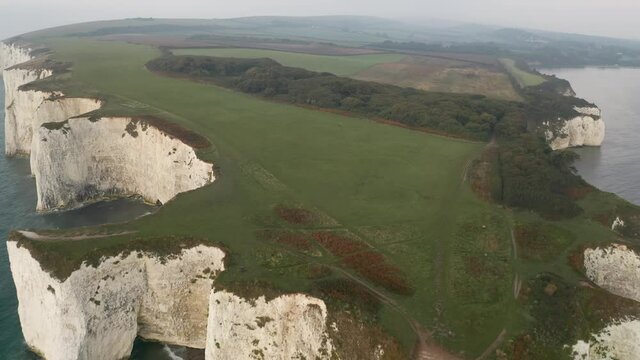 Aerial view over the white cliffs of Dover near Old Harry Rocks 
Drone view from the south coast of England, 2021
