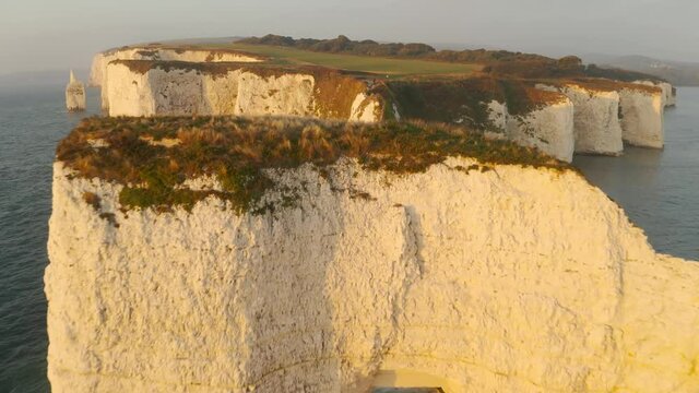 Aerial view over the white cliffs of Dover near Old Harry Rocks 
Drone view from the south coast of England, 2021
