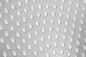 Abstract metal background. Cooking utensils with a thick aluminum base. Background, texture