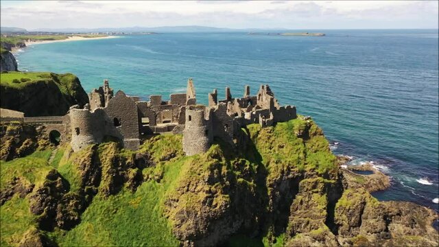 Drone sequence showing the beautiful Dunluce Castle on the Co. Antrim Coast of N. Ireland