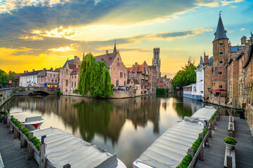 Rozenhoedkaai in the centre of Bruges illuminated at sunset, West Flanders province, Belgium