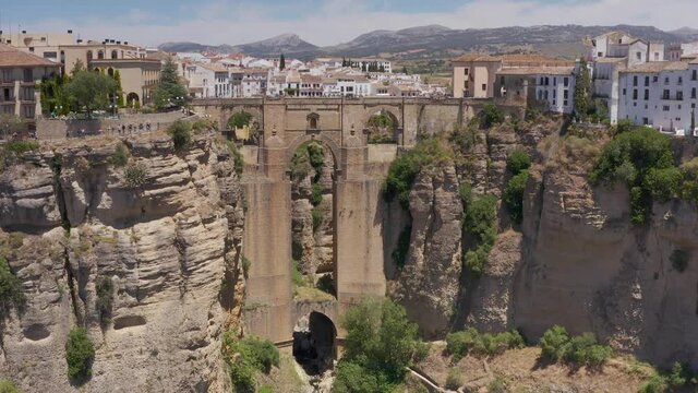 Aerial view over Puente Nuevo Ronda Town, Spain 

Ronda is a town in the Spanish province of M&aacute;laga, drone, 2021

