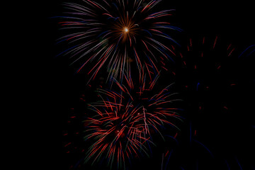 Fireworks in night sky, to celebrate a holiday, seasonal or special event.