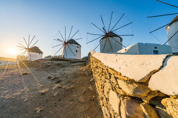 Windmills of Mykonos island at sunset. Greece