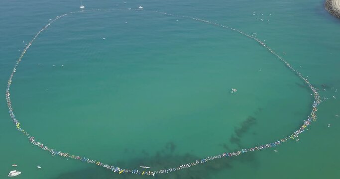 A circle of surfers in Mediterranean Sea Aerial view
World record of Nearly 1,000 surfers took part in a protest against natural gas production near Israel&sbquo;&Auml;&ocirc;s coastline, 2018