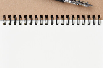 close up of notebook with pen for background