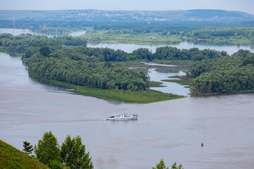 Nizhnekamsk, Tatarstan, Russia - 06.16.2021: River tram goes along the Kama river