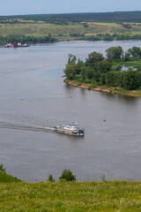 Nizhnekamsk, Tatarstan, Russia - 06.16.2021: Pusher vessel goes on the Kama river