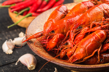 Crayfish. Red boiled crawfishes on table in rustic style,  Lobster closeup.