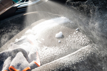 dry cleaning of car interior with spray foam